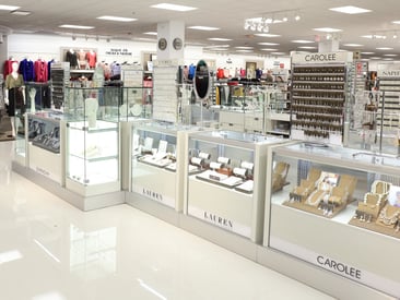 Store displaying a different angle of multiple glass countertop showcases