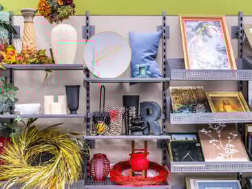 Showing Di Simo modular fixture outrigger display with shelves